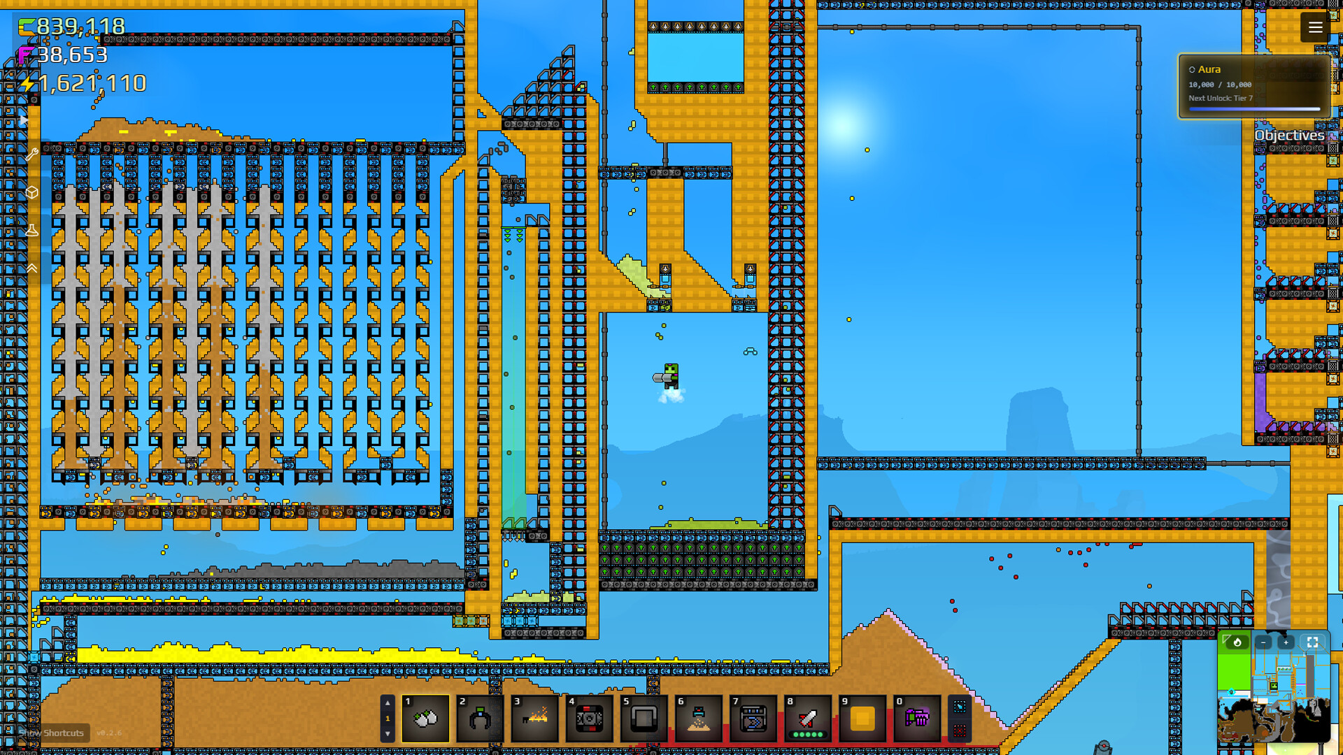 A mid-game gold line — walls of shakers turning wet sand into income.